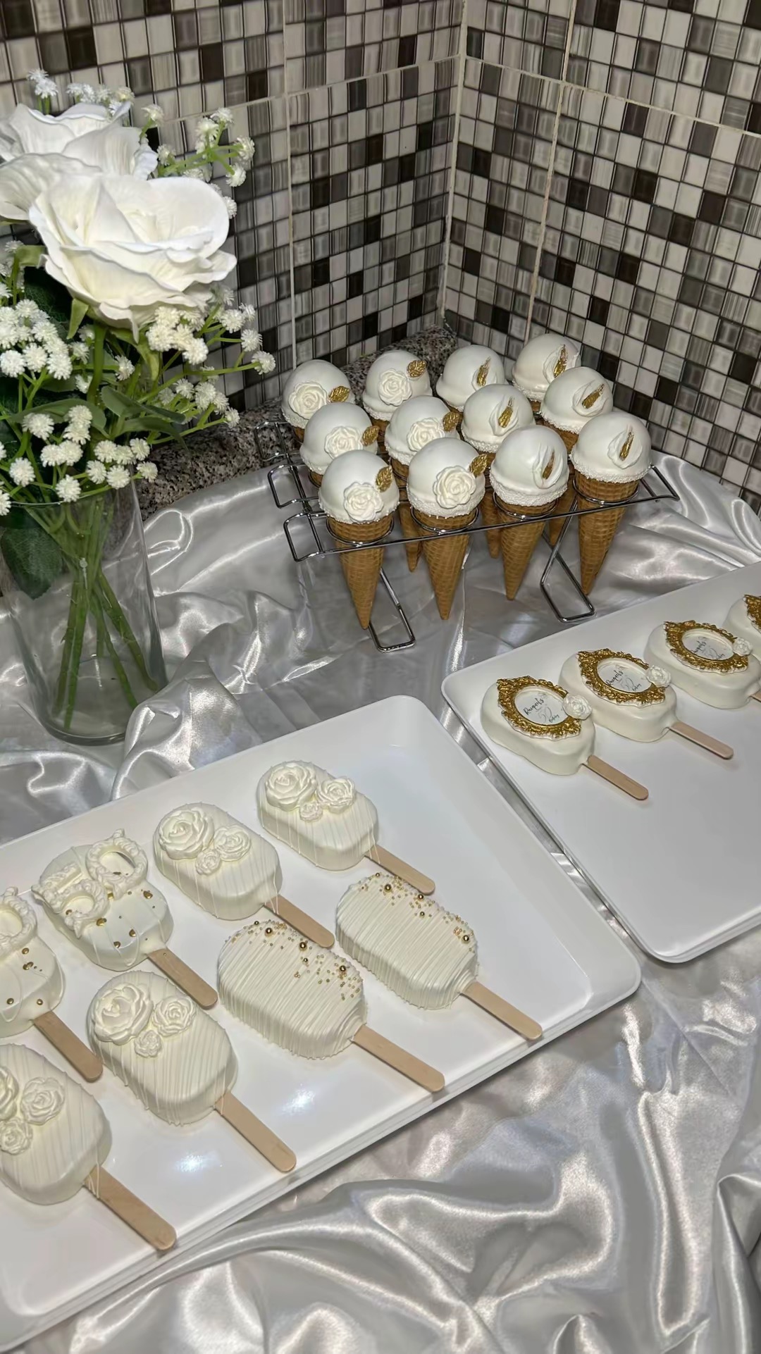 White and gold cakesicles and cake cones